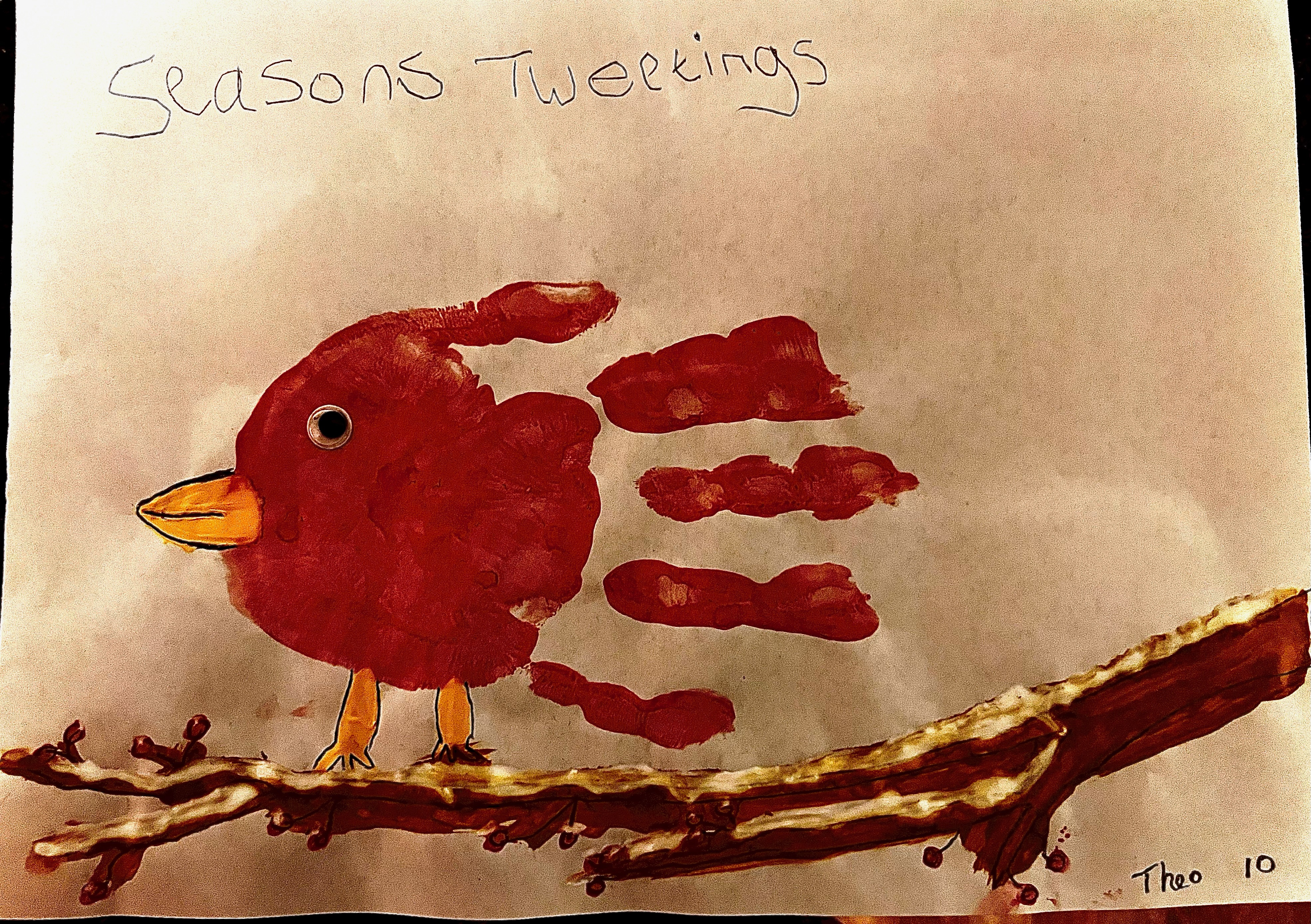 Theo Walker's Christmas card entry. It features a robin made of a handprint.